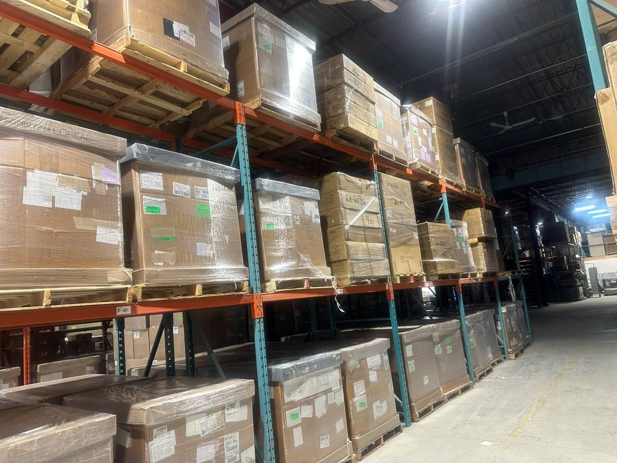 Labelled, wrapped pallets stored in racked positions at GTC Logistics